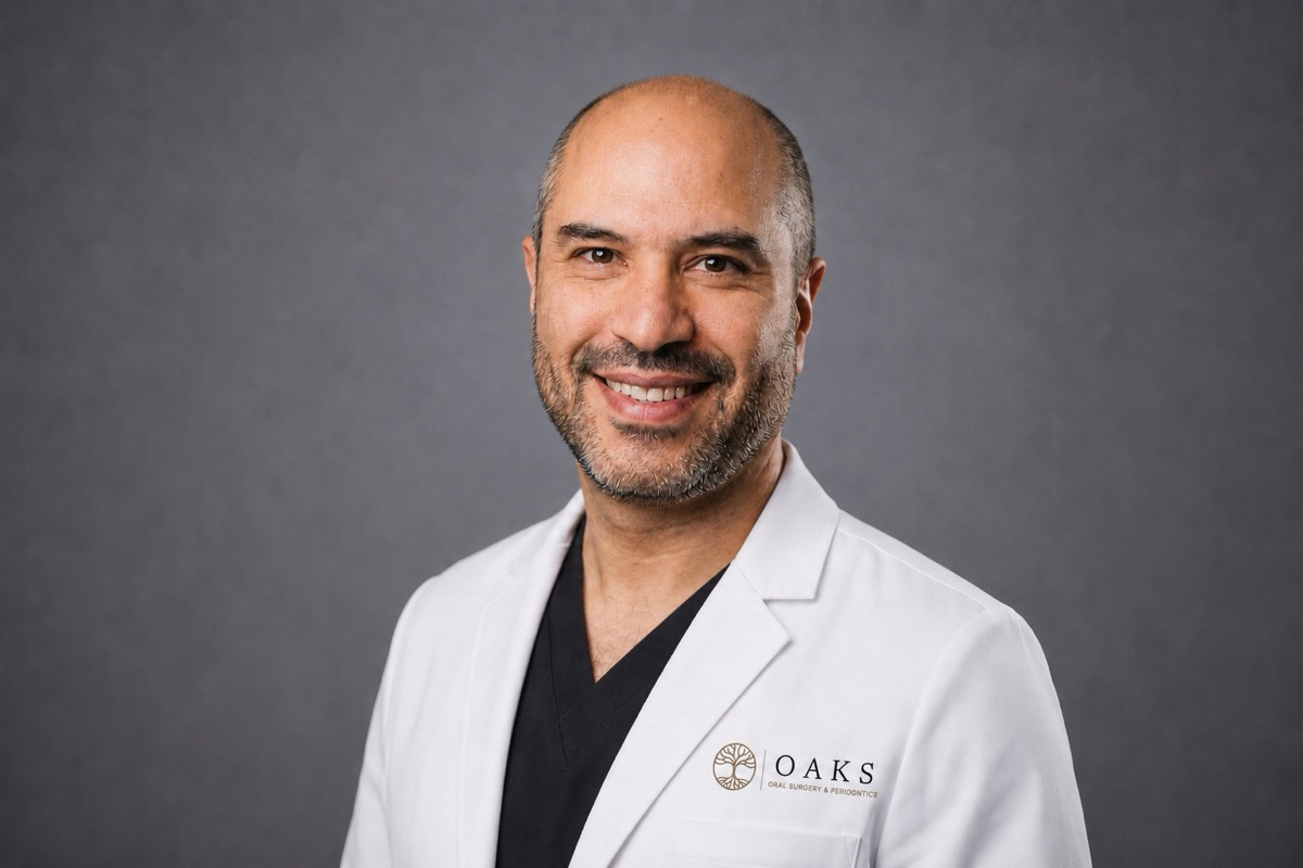 Dr. Neema Bak, DDS, PhD — board-certified periodontist and dental implant specialist at Oaks Oral Surgery & Periodontics